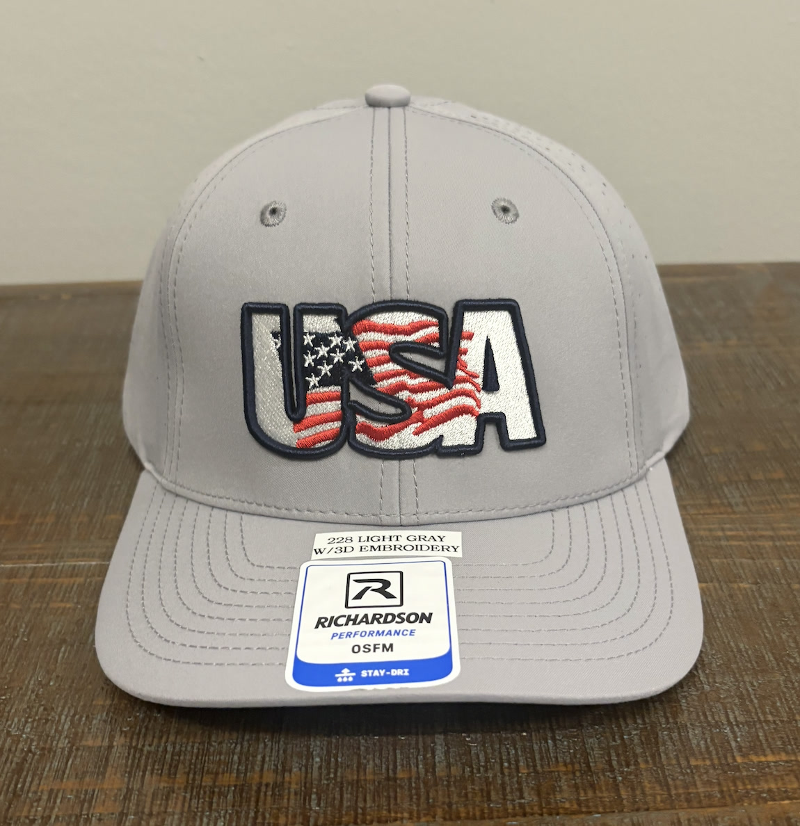 Light grey Richardson 228 hat with USA flag design in 3D puff embroidery