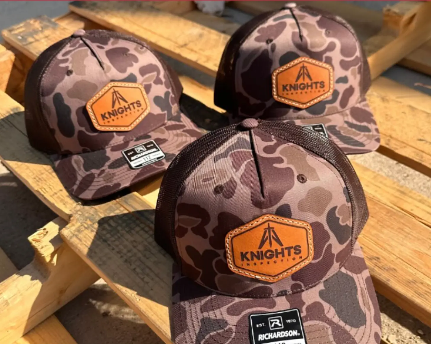 Three camo Richardson trucker caps with leather Knights Inspection patches